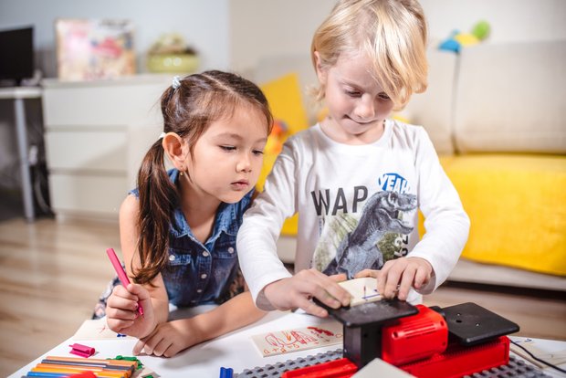 PLAymake children working with the set and the toy